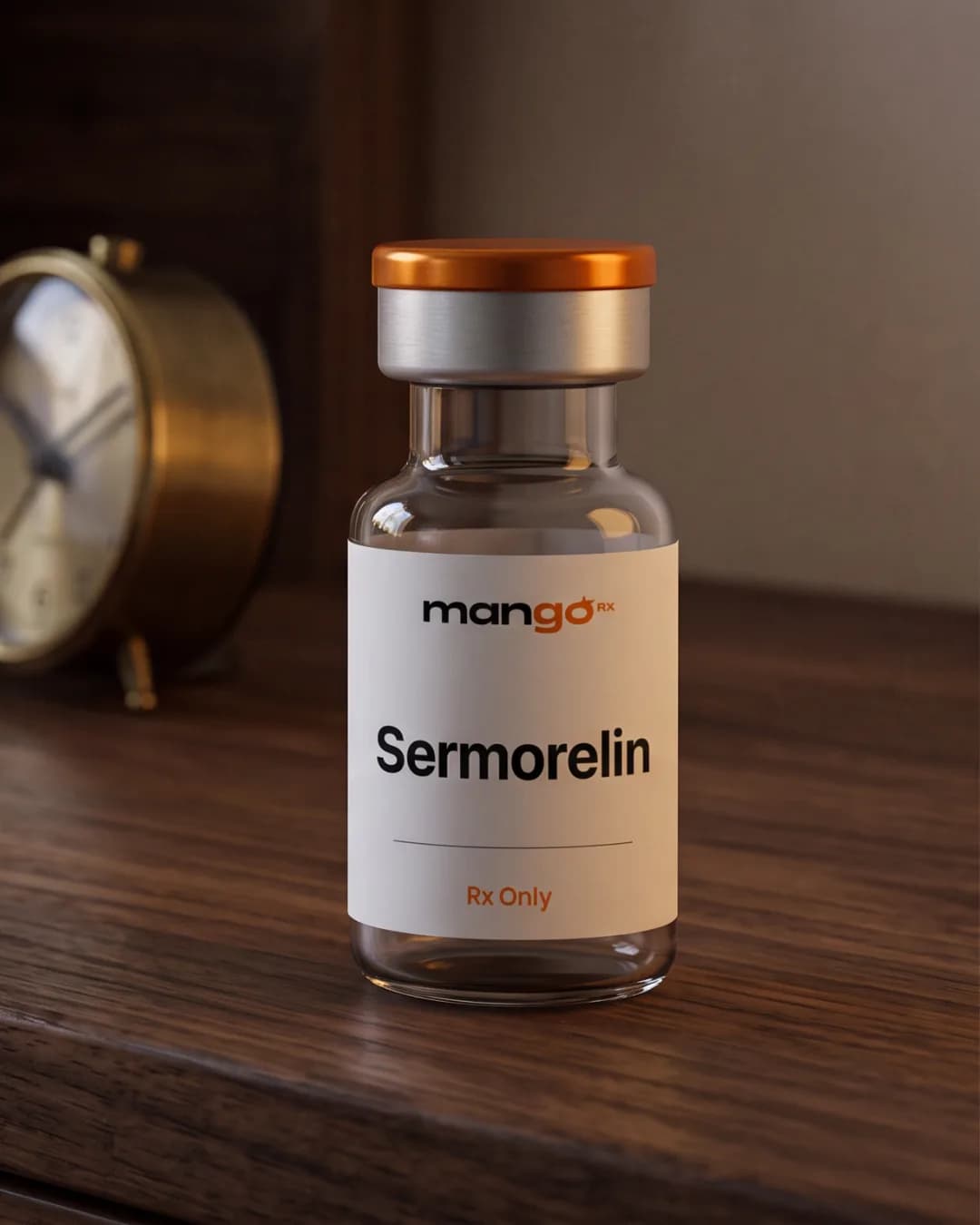 A MangoRx Sermorelin injection vial on a nightstand